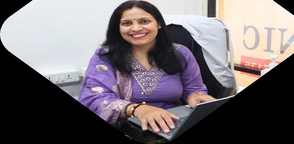 Dr. Poonam Solanki at her desk